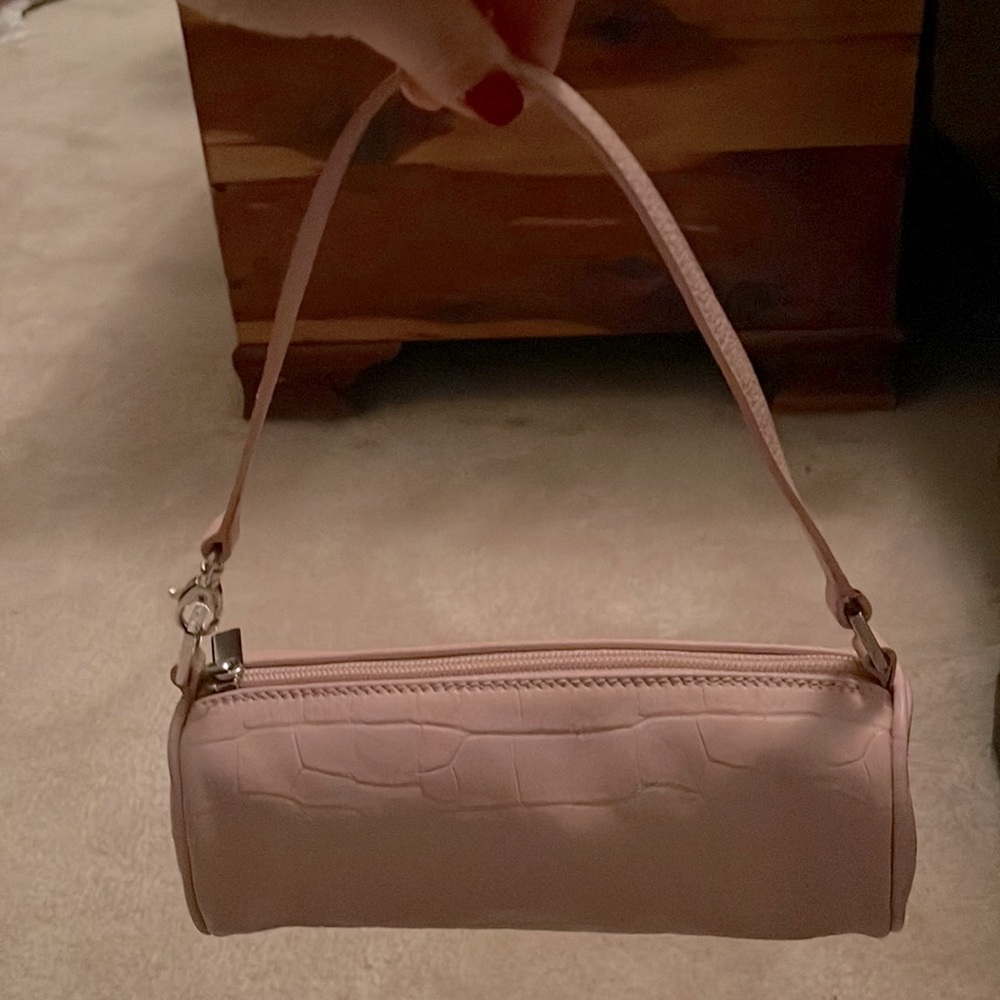 Pink leather mini bag.